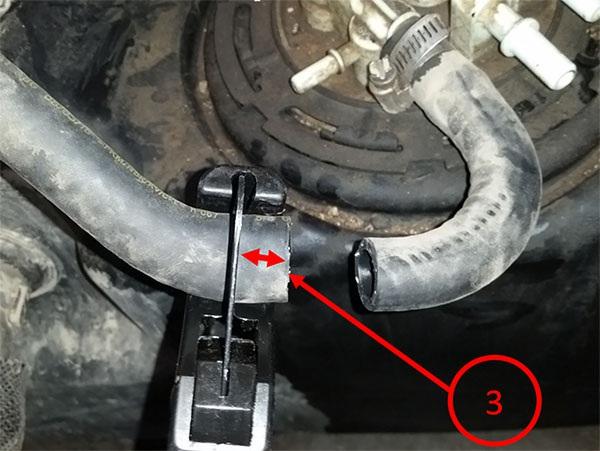 5. Connect the supplied hose, from the fuel transfer line kit part number 84214102, with the side of the "Y" facing toward the tank as seen below