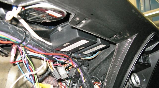 NOTE: There are extra holes in the mounting plate so you can wire tie your harness to the mounting plate. Figure 37 Mount Headlight Module (Wiper Module also Shown) 36.