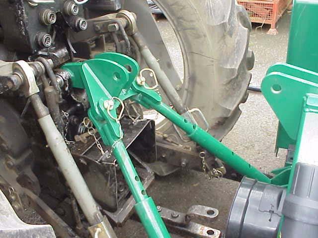 Attaching Your Machine To The Tractor 3 Point Linkage 4. Swing forward stabiliser bars and attach to stabiliser yoke. Be sure the stabiliser bars are free to slide.