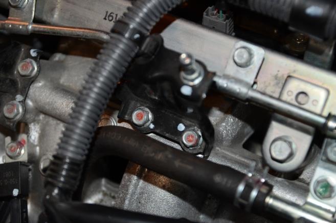 Disconnect the fuel hose from the fuel rail hard line. Remove the fuel hose from vehicle.