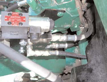 7. Continued... Connect the hose (P) to the LS port on the hydraulic control block as shown.