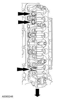 Page 3 of 18 6. NOTE: Do not allow the valve keepers to fall off of the valve or the valve may drop into the cylinder. If a valve drops into the cylinder, the cylinder head must be removed.