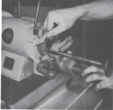 from seat, and grind an equal amount off end of valve stem with the micrometer attachment on No. 956 machine.