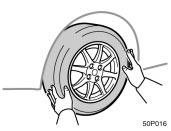 CAUTION Changing wheels Never get under the vehicle when the vehicle is supported by the jack alone. 50p016 50p017b 6. Remove the wheel nuts and change tires.