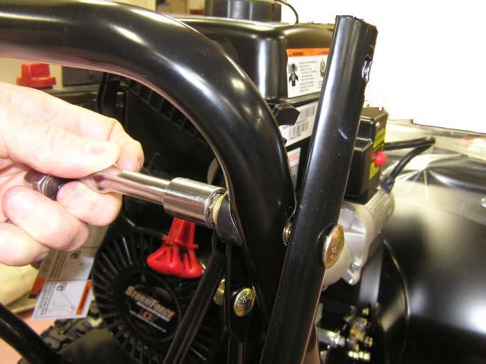 Attach upper handlebar assembly to lower handlebar using two sets of the handlebar hardware.