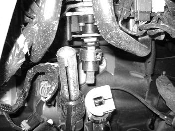Figure 4C 15. Slide the steering shaft up onto the steering extension and fasten with the stock bolt. Torque bolt to 40 ft-lbs.»under» the Hood 16.