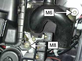 e. Remove the rear M8 bolt fr