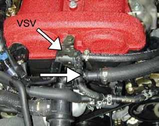 n. Remove the M6 bolt on the power steering reservoir bracket in preparation to install the AEM heat shield.