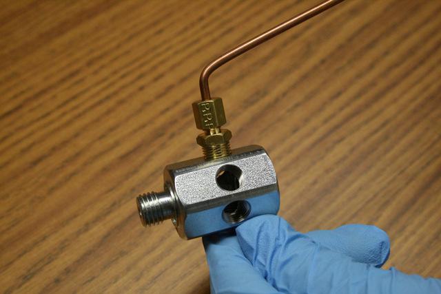 10. Attach the included brass tubing to the compression fitting and then add