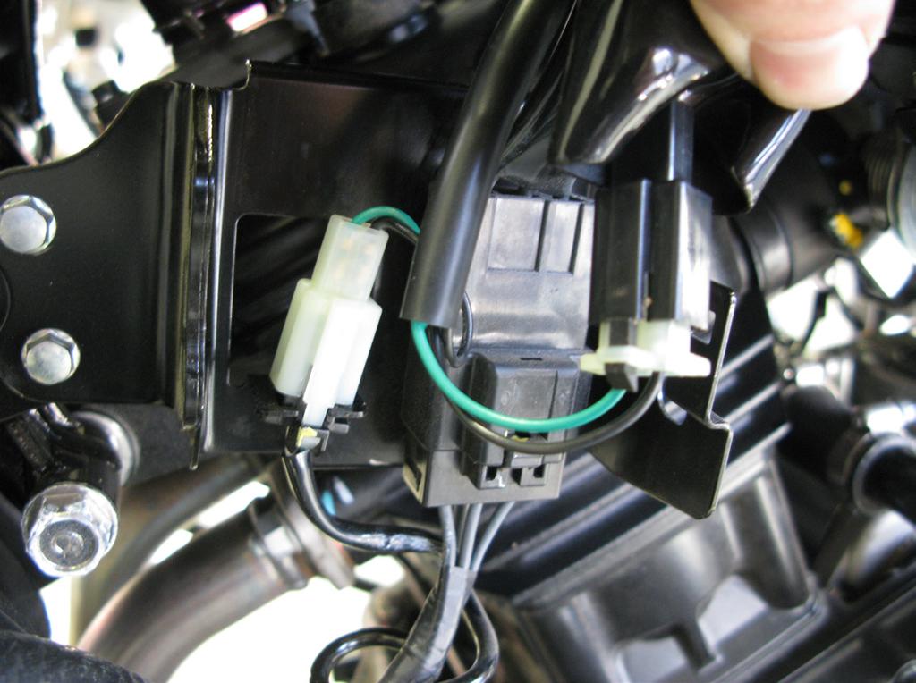 Locate the blue factory CKPS s which are found on the right side of the air box and disconnect them.