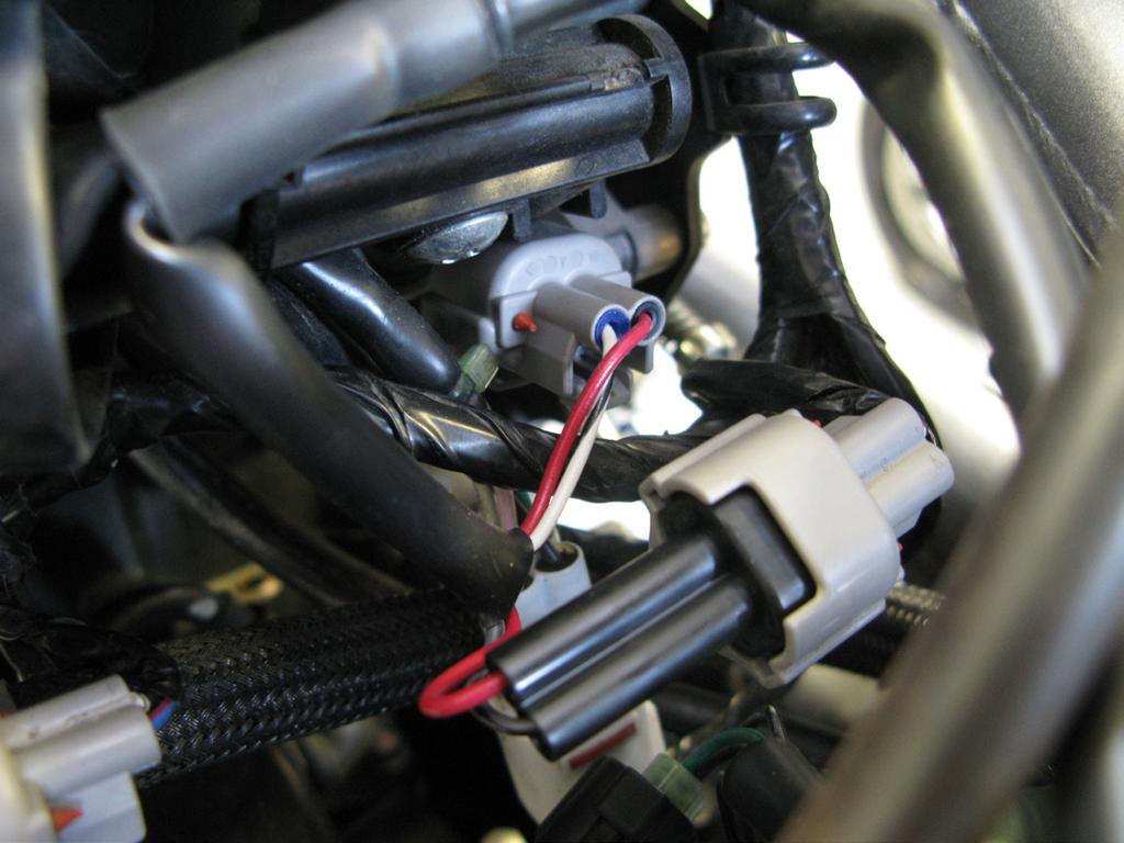Disconnect the factory injector s from the left and right injectors.