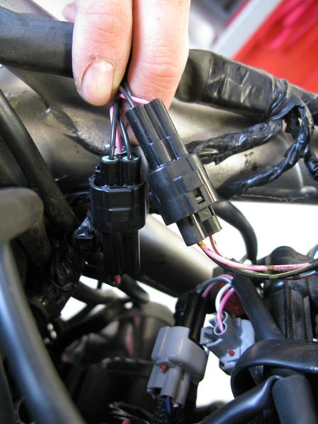 8. Locate the factory speed sensor s, found on the left side of the engine compartment, and disconnect.