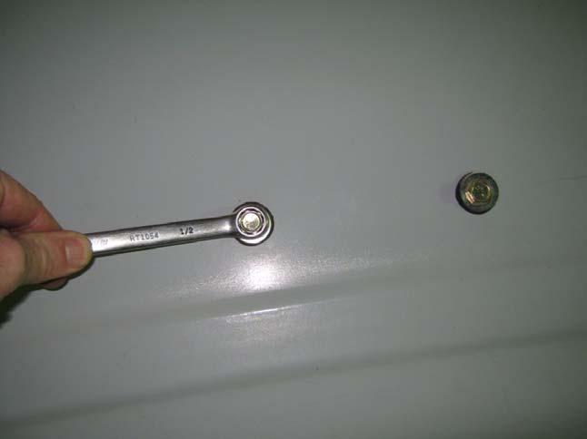Installation Procedure 12. Remove the bolts using a 1/2 wrench. Discard the bolts. See Figure 2-9.