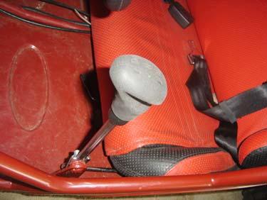 so that you can avoid the danger arising from the unexpected running. The back gear device for this kart is located at the right and lower part of Steer Wheel.