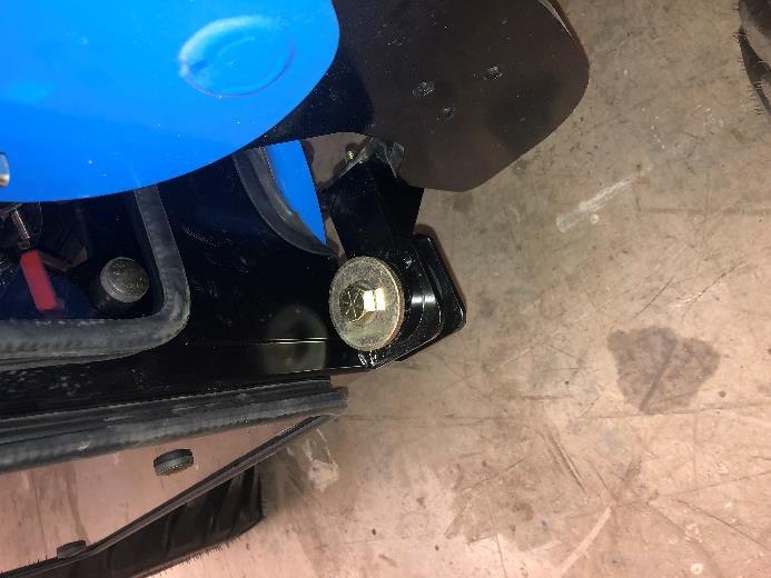 . For the rear mounts, the heavy flat washer goes underneath the bracket plate.. Once all four fasteners are started, release tension on the hoist.