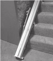 FOLDING RAIL INSTALLATION 4. Place the rail onto the stairway with the bottom bracket on the second step, as shown.