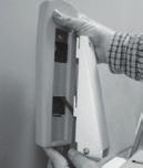 Disconnect plug on armrest control, switch armrests, and reconnect plug. Replace armrests and tighten screws.