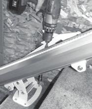 This procedure includes plugging battery charging wire harness for folding rail into charging harness from upper track.