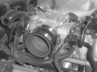 f) Attach coupler and secure to the throttle body with