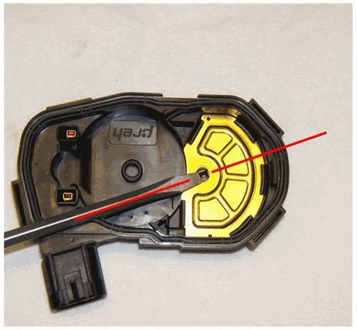 7 of 13 2/10/2016 6:46 PM 15. Place the TP sensor cover in the position as shown. Confirm the TP sensor drive slot orientation is aligned in the TP sensor cover as shown.