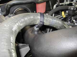 Attach the intake tube bracket to the airbox using the