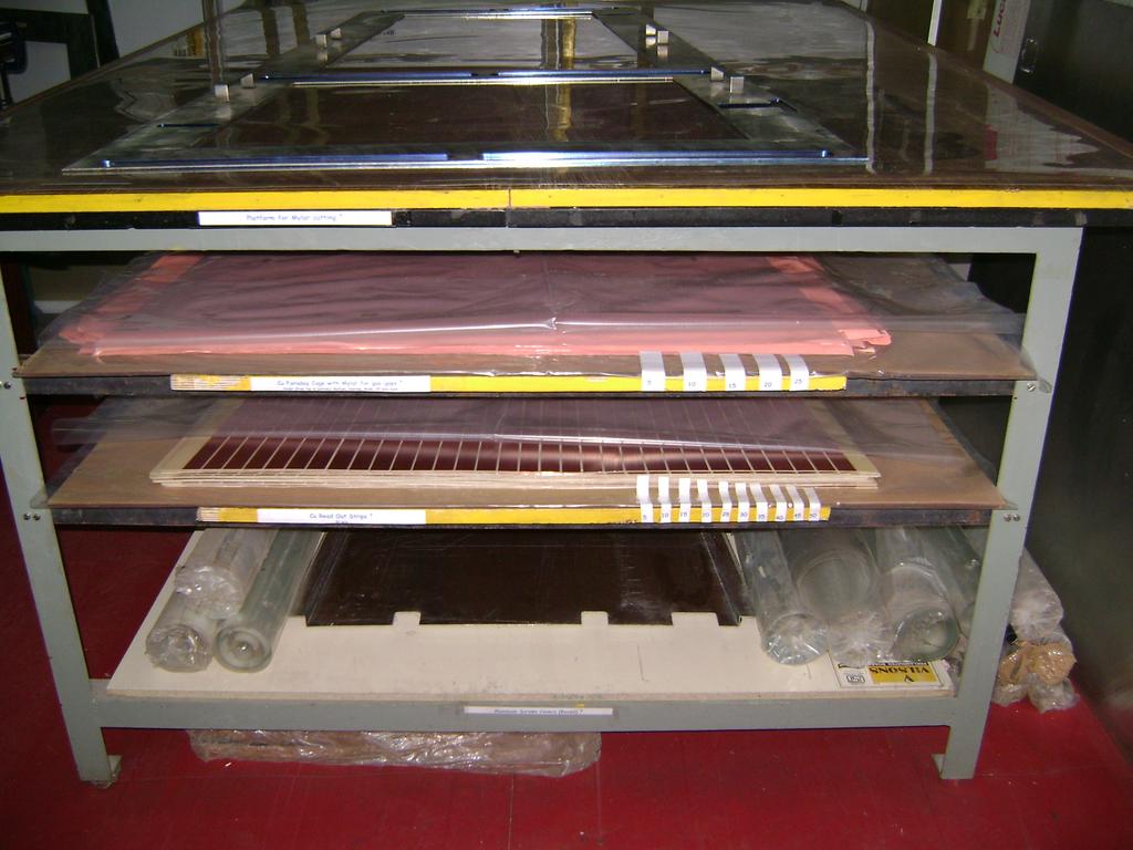 Cu Faraday with mylar, Cu Read Out Strips, Screen Covers stored in shelves Platform for mylar