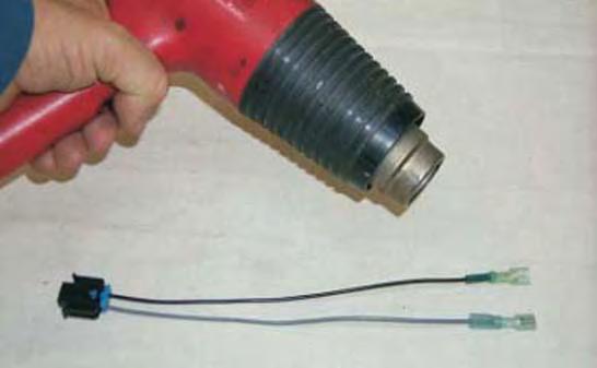 On one end of the pump harness, cut the wires 1 from the plug and strip the insulation back 1/4.