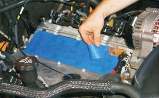 69. Cover the intake ports with tape or clean rags to