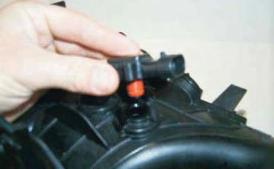 85. Remove the stock MAP sensor from the stock intake manifold by