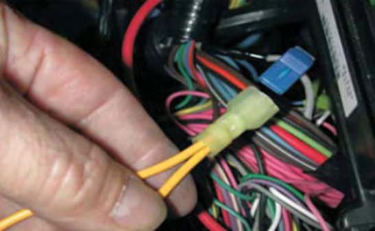 Use a 12-volt automotive test light or voltmeter to check that you have the correct wire.
