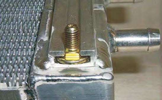 153. Install two of the round-headed carriage bolts supplied