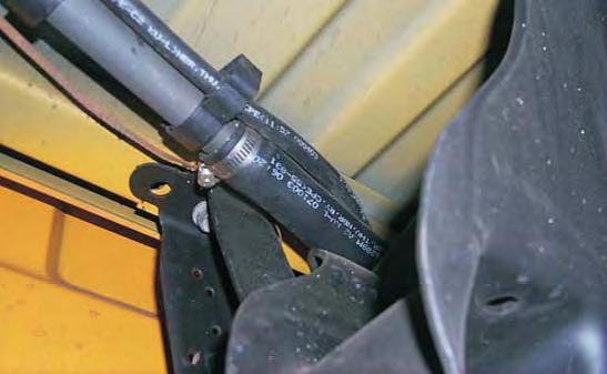5. Loosen the clamp and remove the fuel fi ll