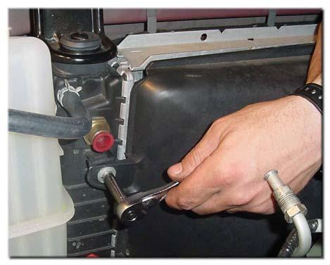 rest of the way off the Water Pump and pull the Fan out between the Radiator and
