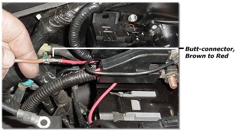 Page 24 of 30 Returning our attention to the passenger side of the engine compartment, we will now run some of the wires for power and connect the Fan Power Harness wires.