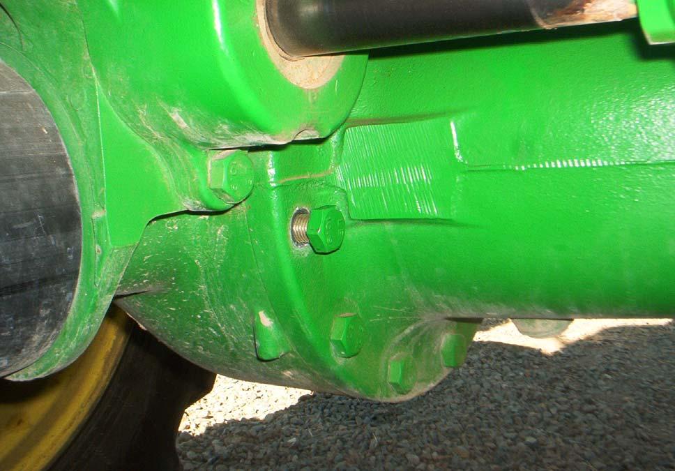 Remove this bolt on right side of the differential housing on right side of front axle