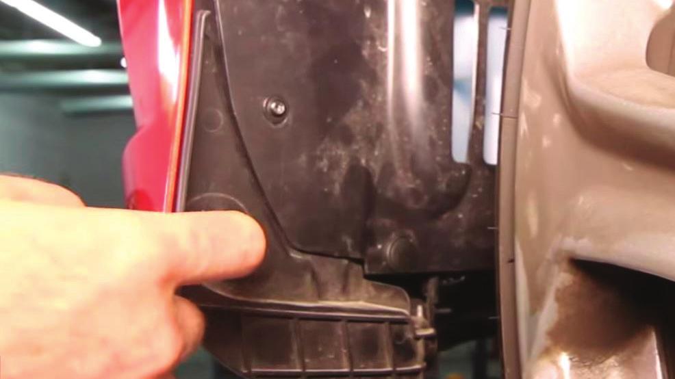 07. Remove the fasteners that secure the fender liners to the front bumper cover.