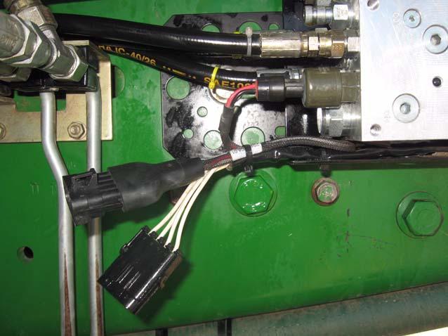 Pressure Relief Valve Adjustment Note: Do not over tighten the Pressure Transducer. 2. Attach the Pressure Transducer Jumper Harness to the Pressure Transducer. 3.