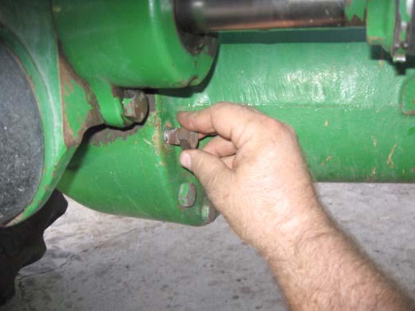 Wheel Angle Sensor Installation Procedure 2. Remove the bolt on the steering axle case with a 24 mm socket and ratchet.