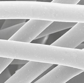 3 micron in diameter to form a web-like net that traps dust on the surface of the media.