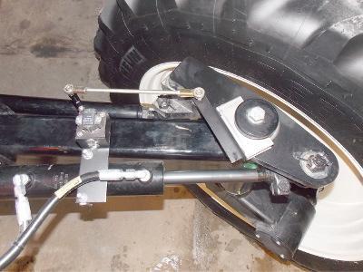 Attach Wheel Angle Sensor and Linkage Rods 6. With the linkage rods disconnected, start the vehicle and manually turn the steering wheel so that the vehicle will travel straight ahead when moving. 7.