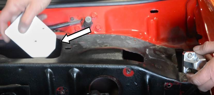 Apply anti-seize to two 3/8-16 1" button head bolts and use with two 3/8 AN washers to install the hood hinges over the cover plates and into the factory hood hinge holes on each side of the truck.