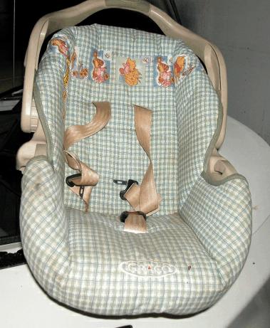 The infant seat was equipped with a 5-point harness, a plastic carrying handle, a stay-in-car base, a canopy, and an infant head rest.