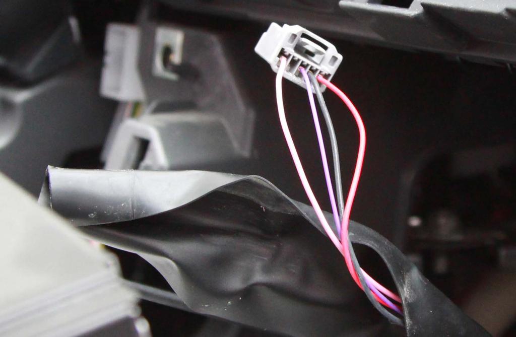 For 2010-2011 Once the radio is removed, locate the gray plug Unwrap the plastic wire cover