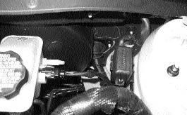 AFTER ASSEMBLY IS SECURED AS SHOWN IN FIGURE 12, MAKE SURE THE CABLE ASSEMBLY IS NOT HOLDING THE THROTTLE