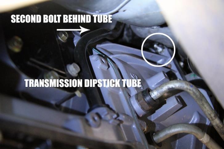 Step 11: Remove the transmission dipstick tube.