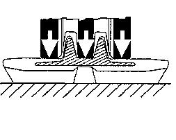 Figure 3 Operating On Slopes: Go directly up or down a slope, not across the slope to prevent tracks from derailing.