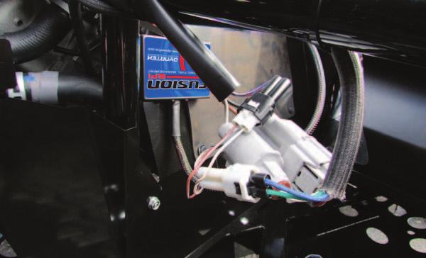 E Fusion harness 5 Remove the rubber cover around the air box.