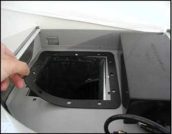 4. Place rubber seal on hood venting area; make sure the openings on rubber