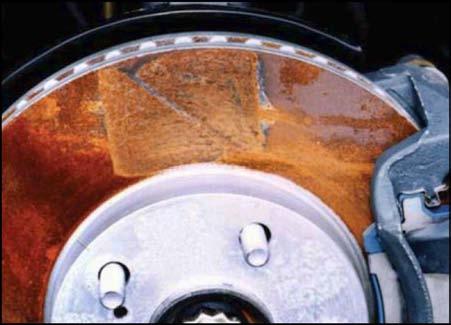 This regular usage will help prevent severe rust build up and the possibility of unwanted brake vibration concerns due to rust. Figure 1. Slight rust on rotor (easy to remove by braking) Figure 2.