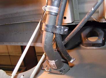 b. Loosen hose clamps on fuel filler hose and vent hose. g.